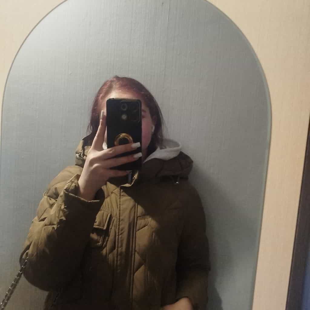 Оля
